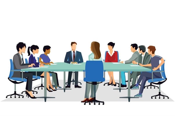 Business meeting with diverse participants.